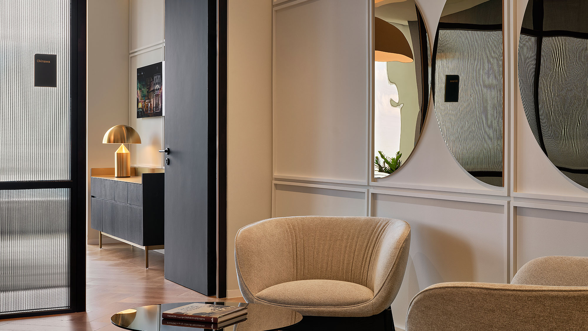 A living room with a large mirror.