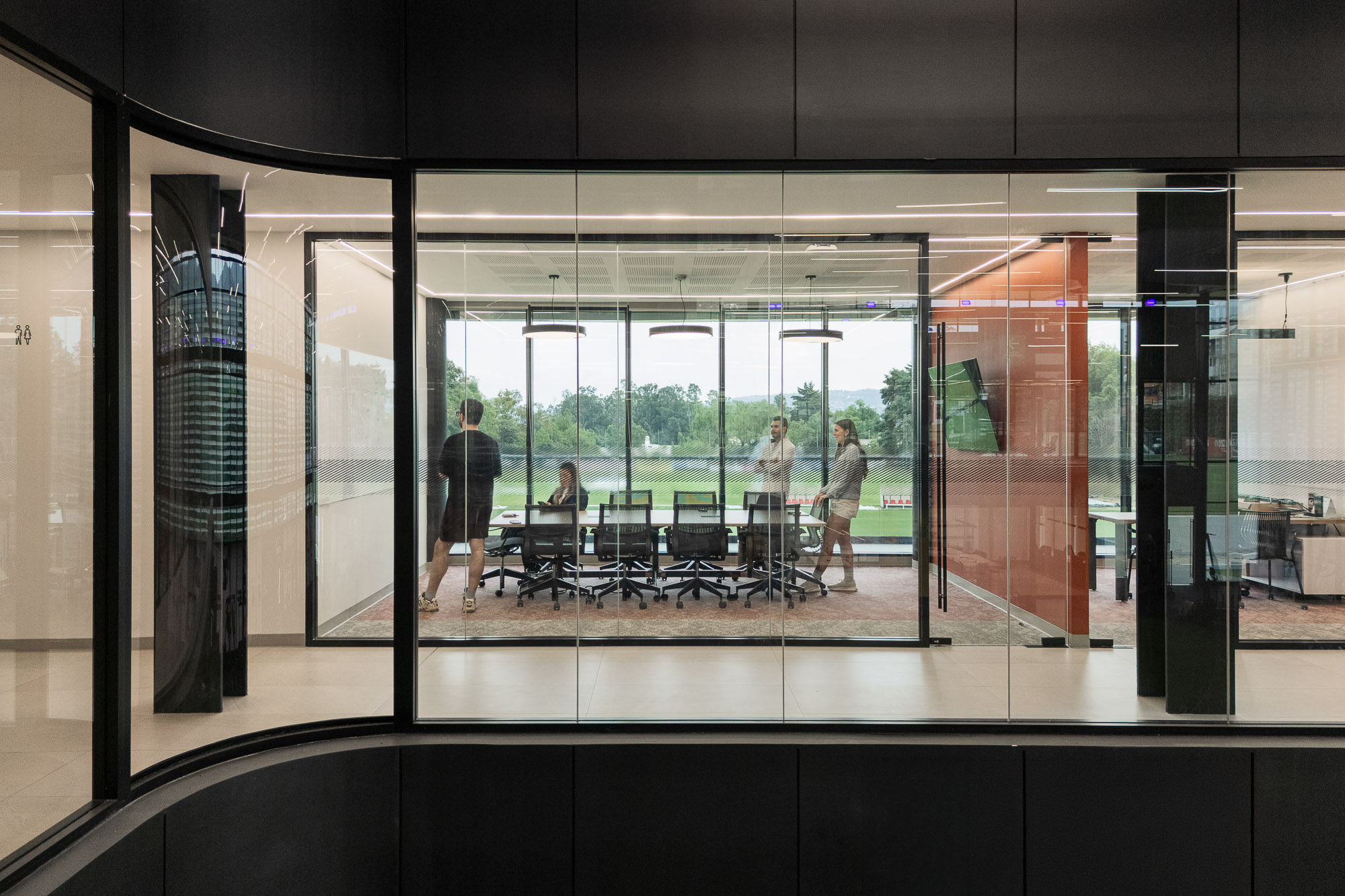 A group of people in a room.