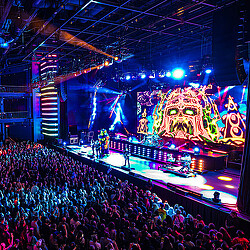 A large crowd of people at a concert.