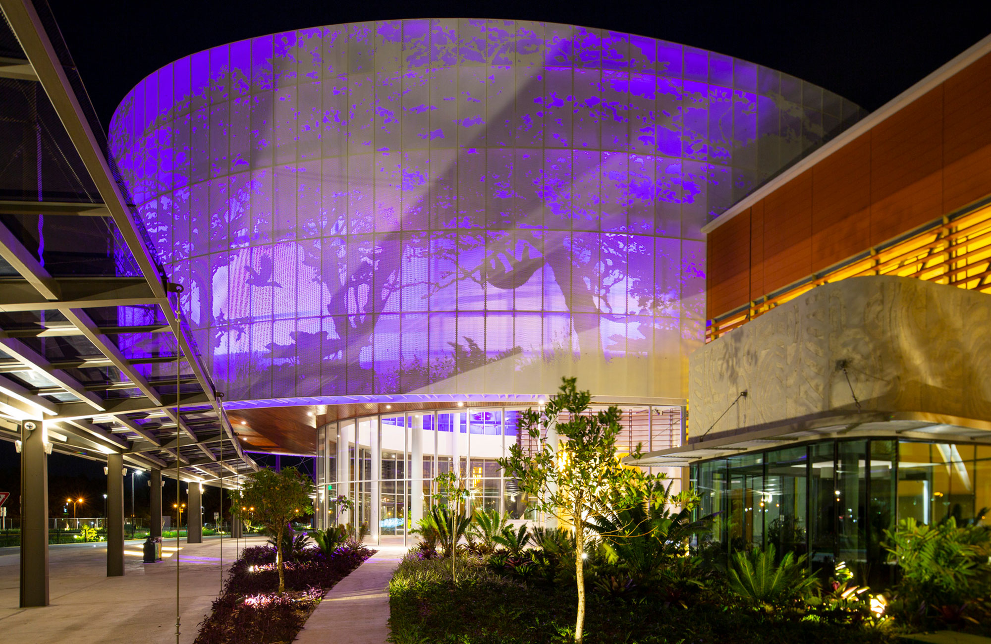 A building with a large glass wall.