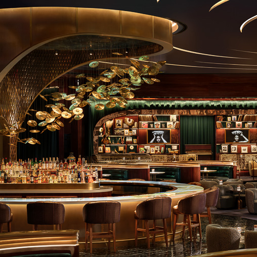 A bar with a chandelier.