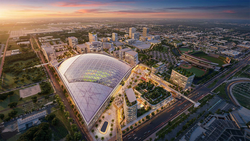 A large stadium with a large roof.