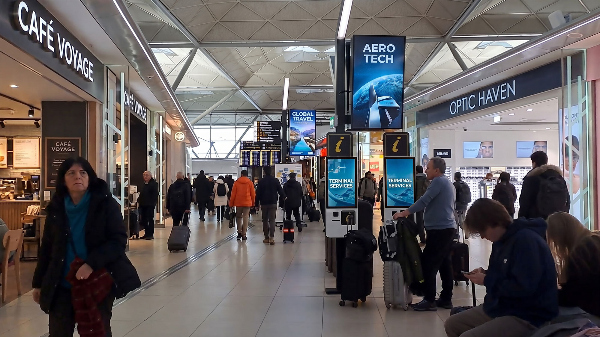 A group of people in a terminal.