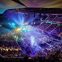 A large crowd of people in a stadium.