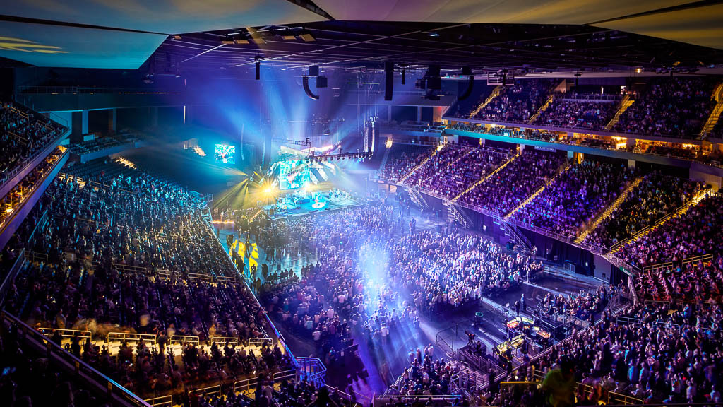 A large crowd of people in a stadium.