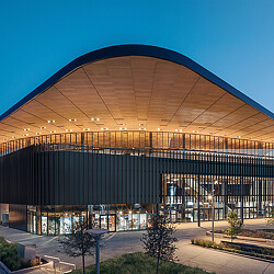 A building with a curved roof.