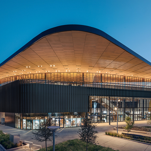 A building with a curved roof.