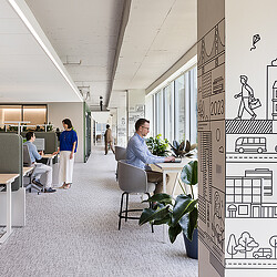 A group of people in an office.