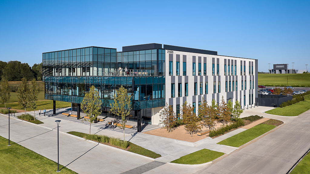 A building with a parking lot.