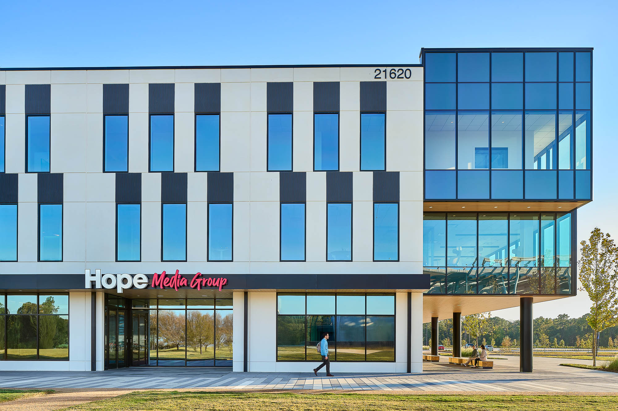 A large building with glass windows.