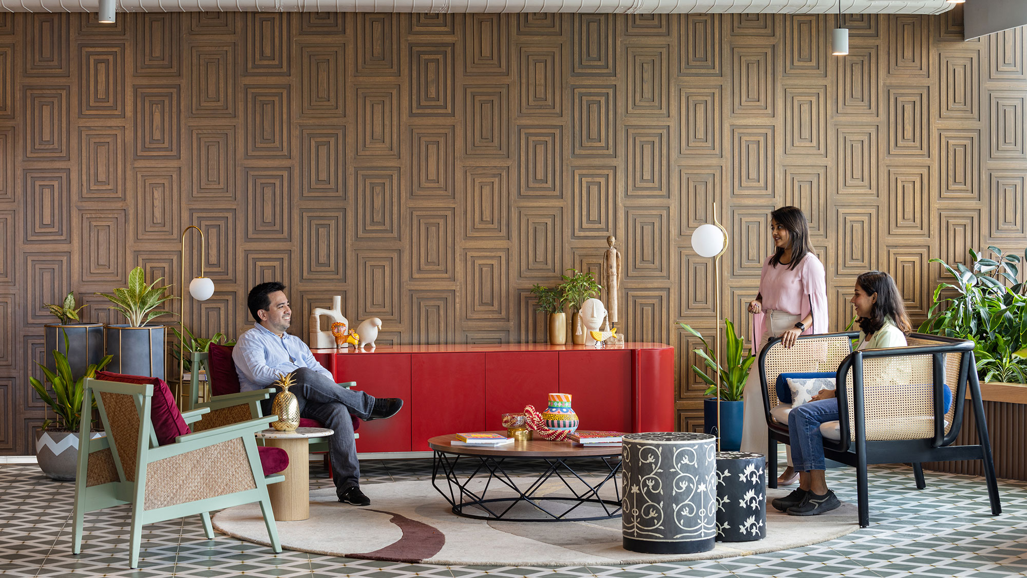 A group of people sitting in chairs.