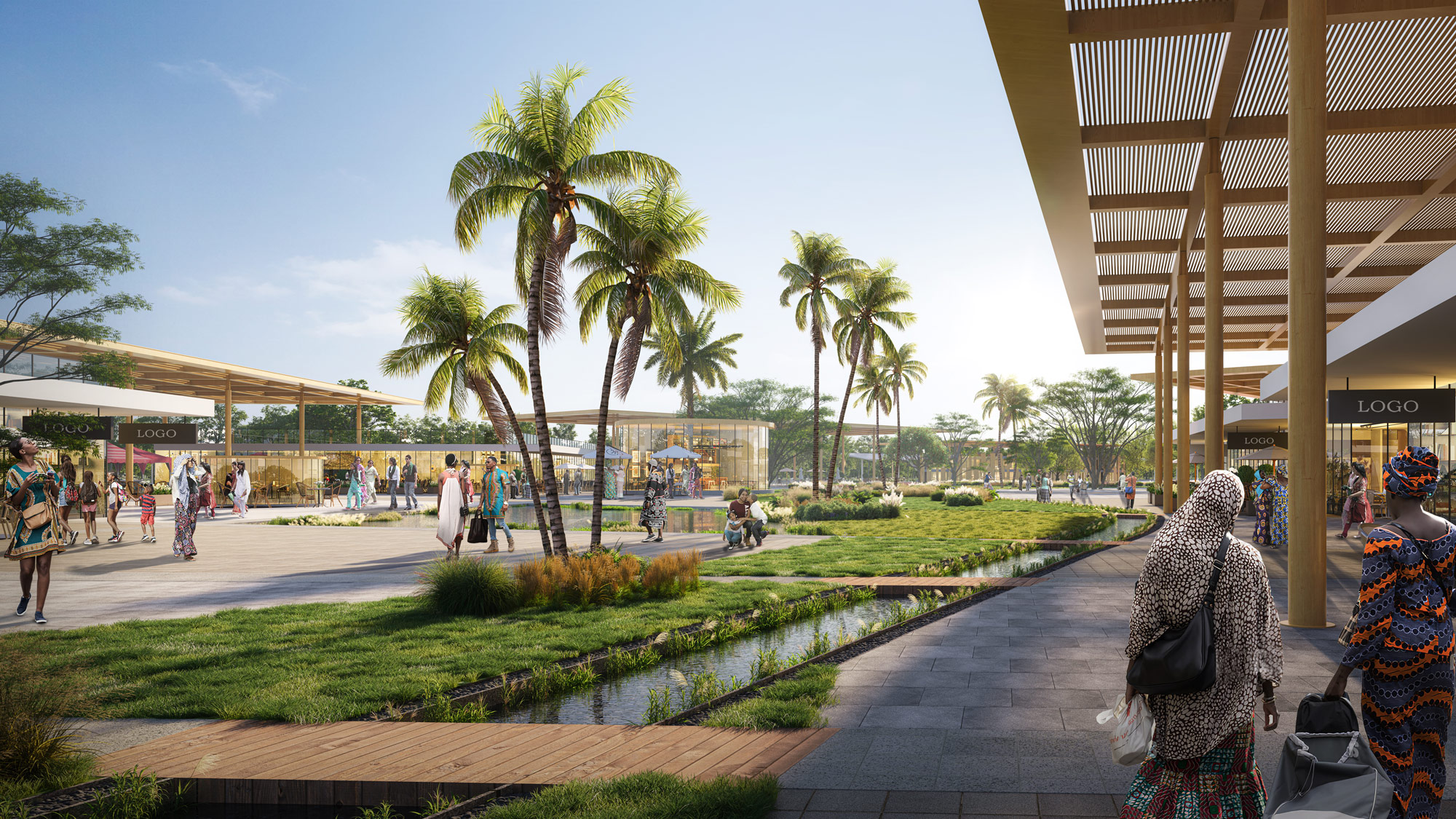 A group of people walking around a park with palm trees.