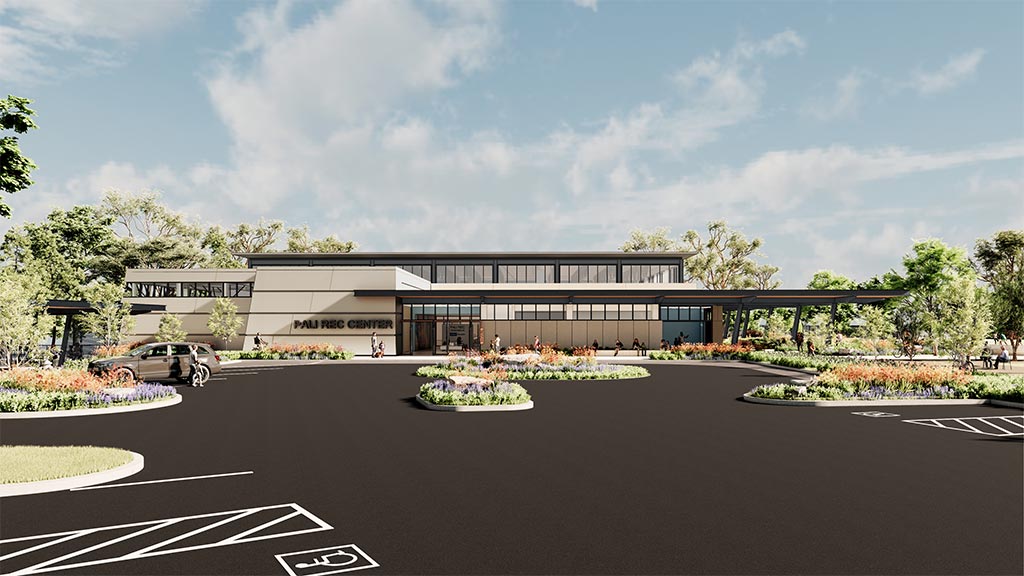 A building with a parking lot.