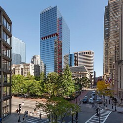 A city street with tall buildings.