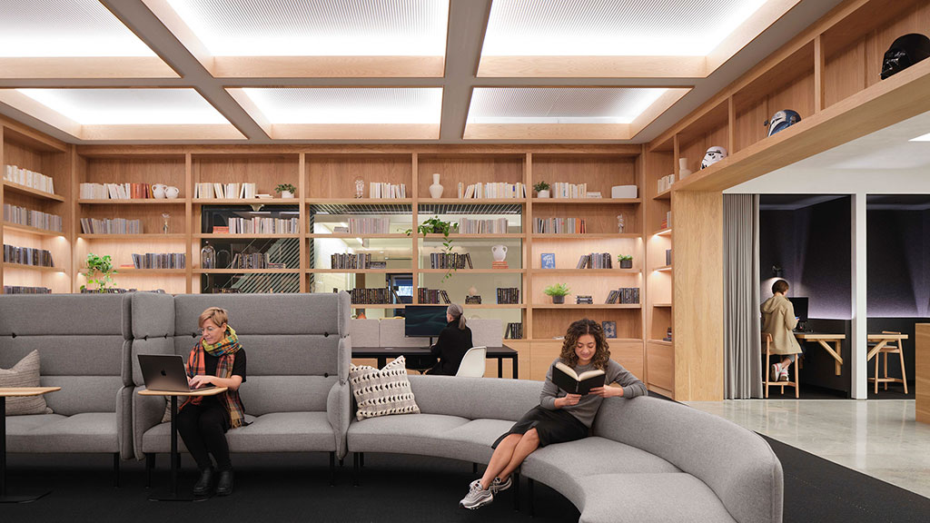 A few women sitting on a couch.