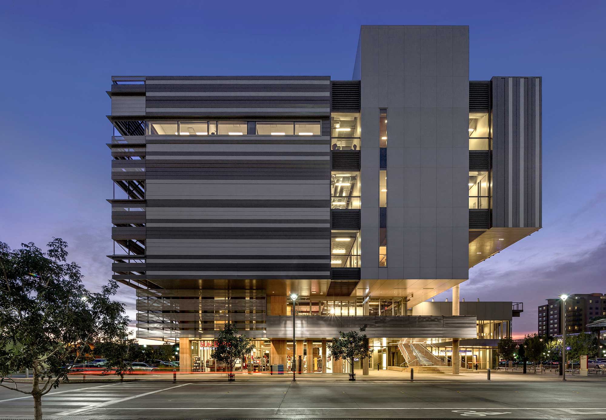 A building with a large glass front.