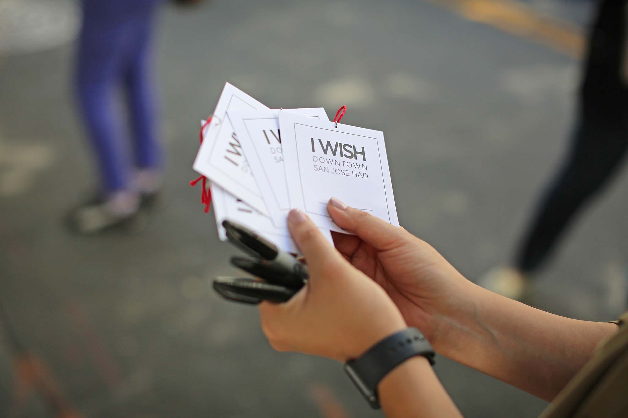A person holding a card.