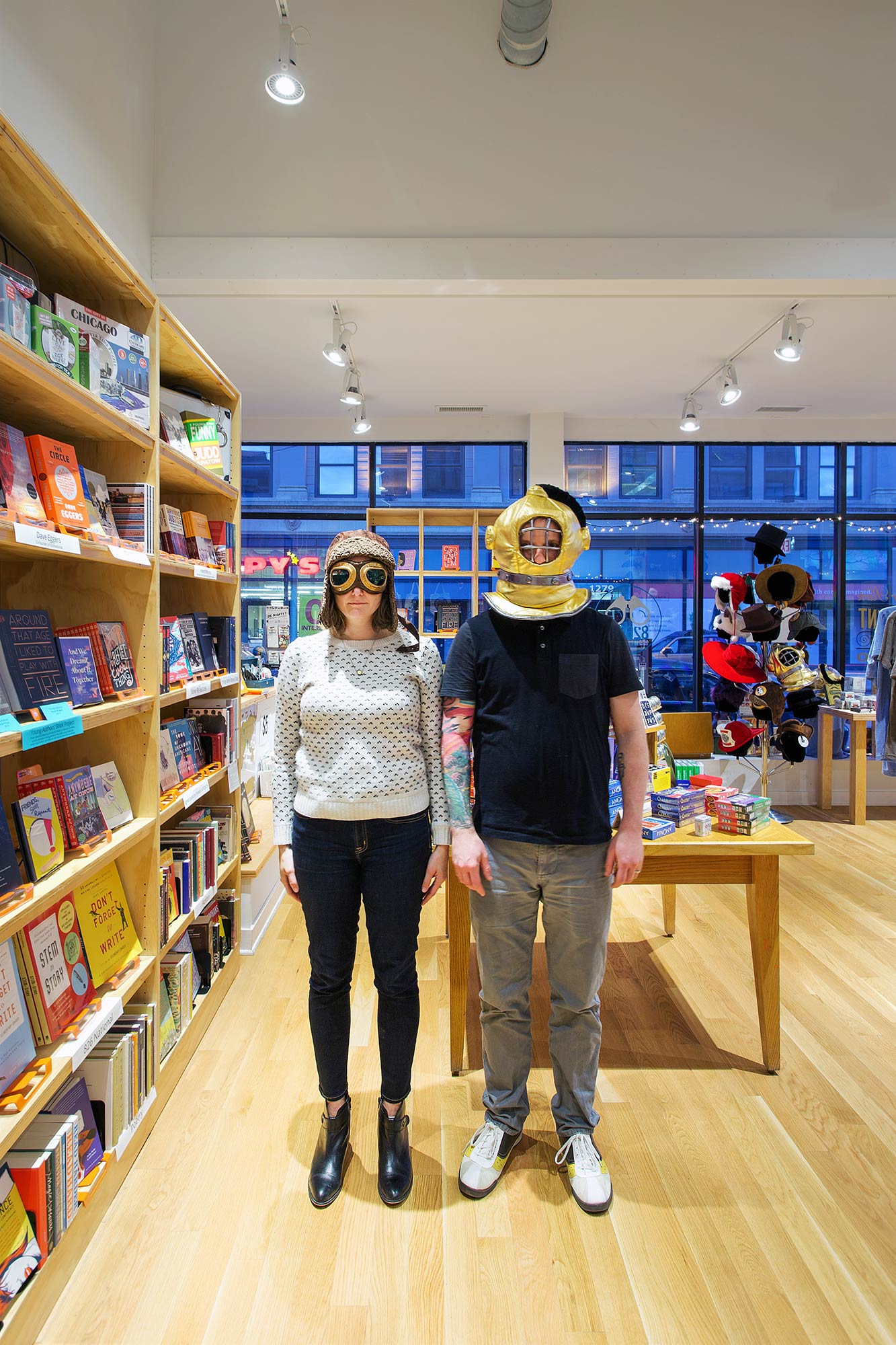 A man and woman wearing masks.