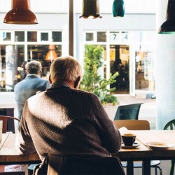 A person sitting at a table.