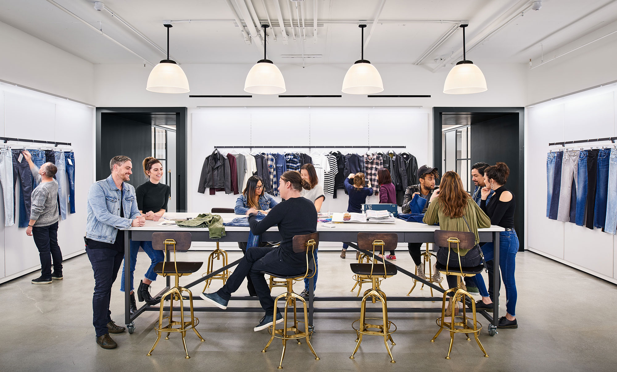 A group of people sitting around a table.