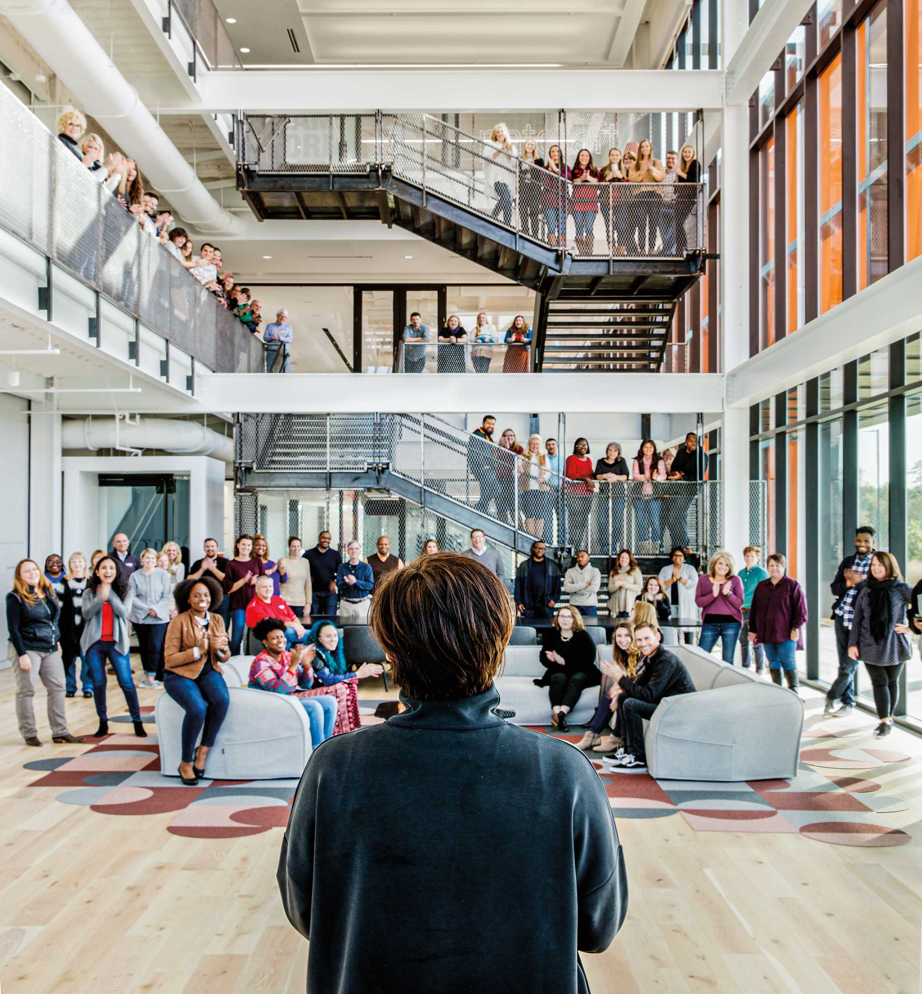 A group of people in a building.