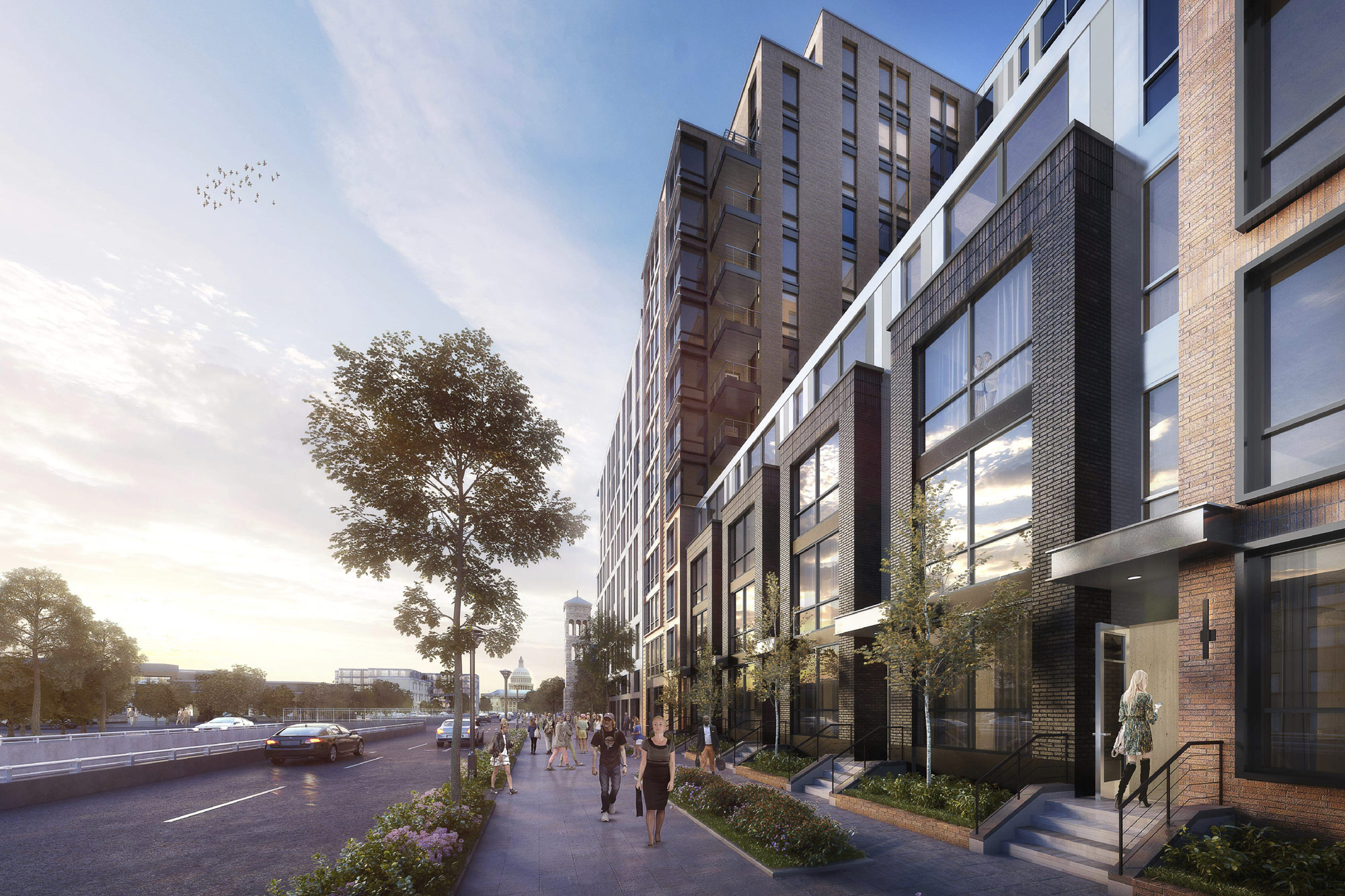 A rendering of a contemporary three-story, mixed-use building on a tree-lined street.