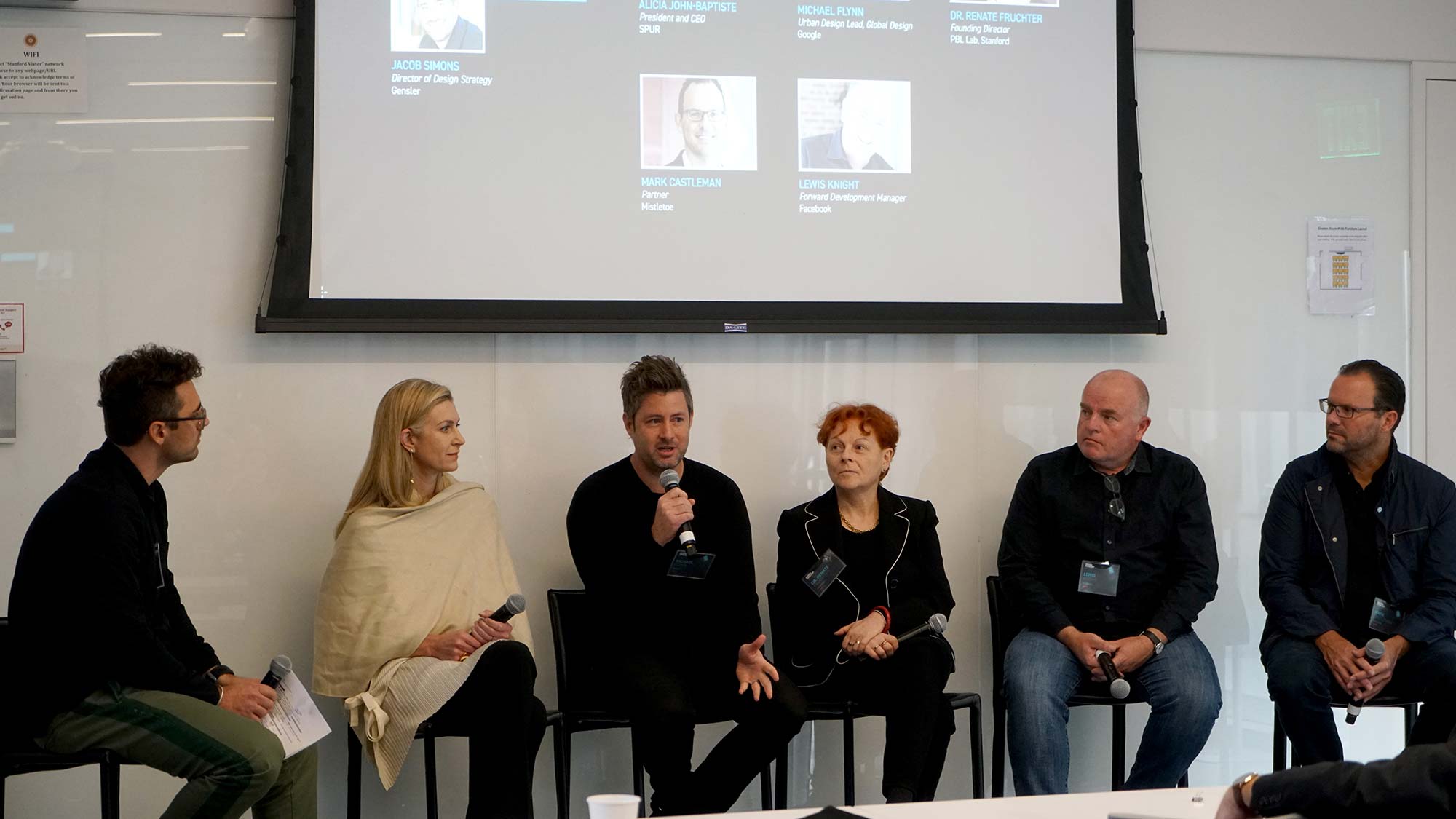 A group of people sitting in chairs.