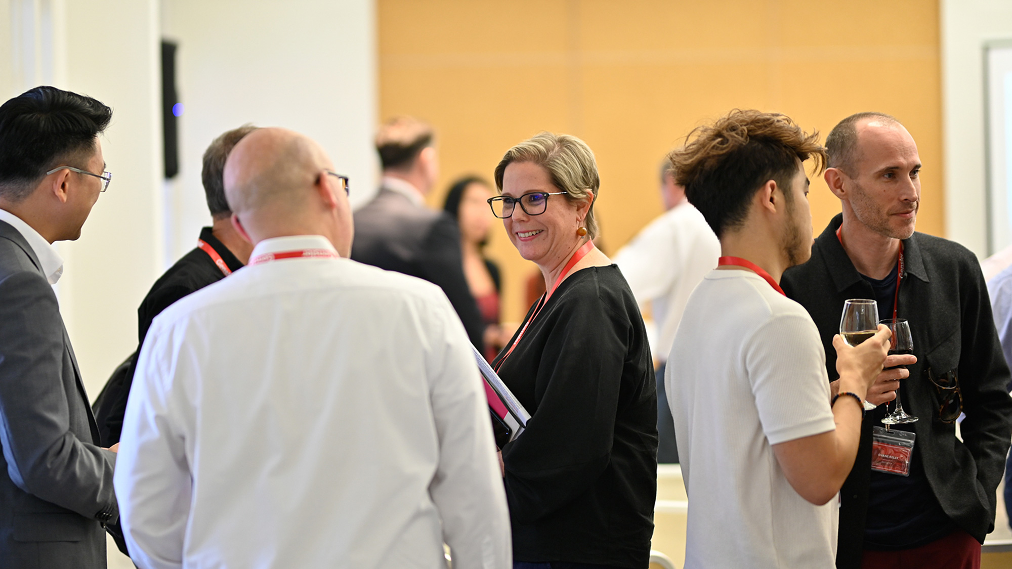 Gensler Singapore Co-Managing Director Angela Spathonis mingles with the crowd.