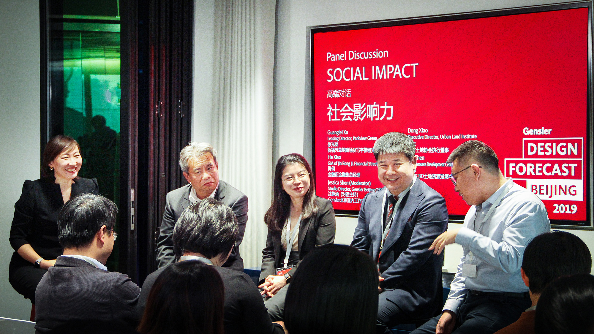 Panelists discuss the topic of social impact