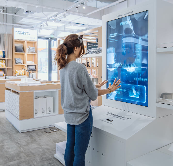 A woman looking at a display.