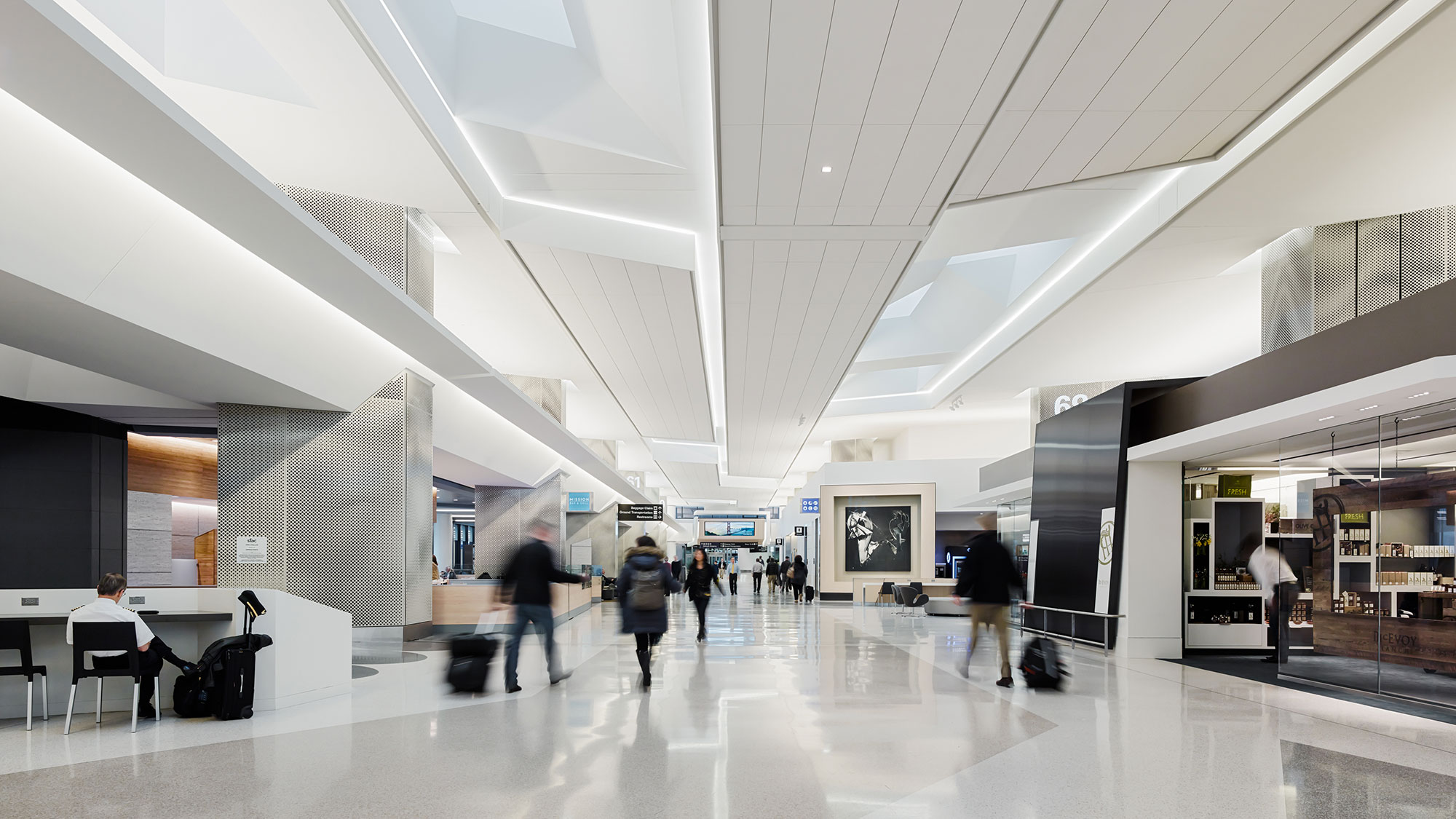 Passengers moving through the terminal at San Francisco International Airport