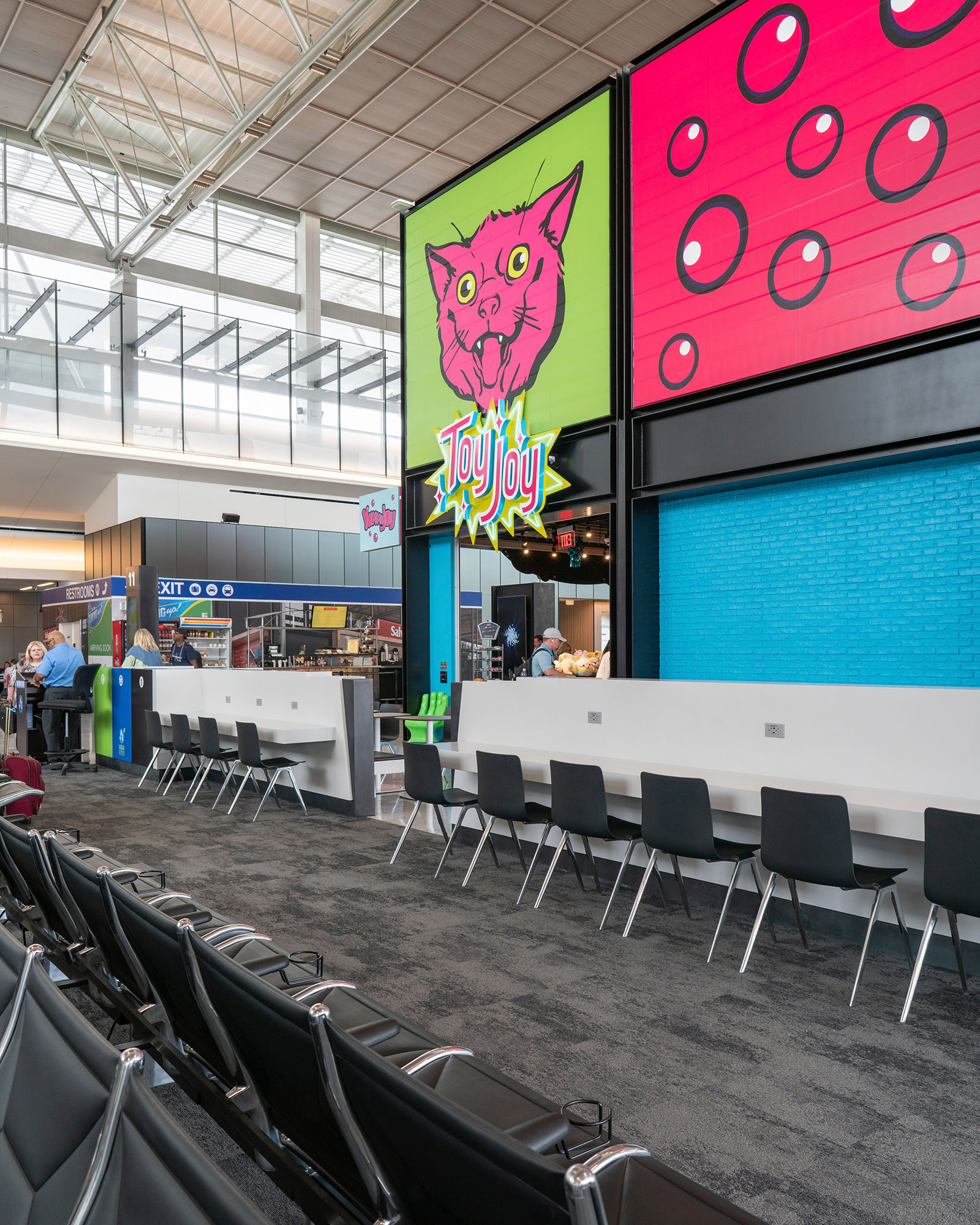 People interact at a ticketing counter inside Austin-Bergstrom International Airport
