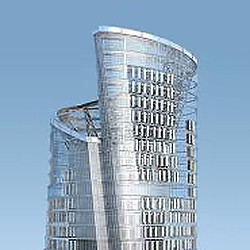 A tall building with a crane.