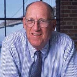 A man wearing a suit and tie.