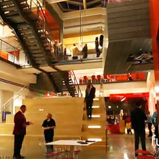 People in a large room.
