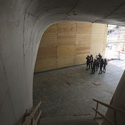 A group of people in a tunnel.