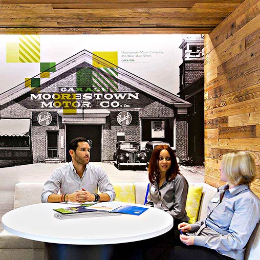 A group of people sitting at a table.