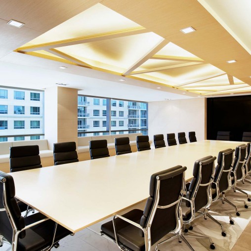 A conference room with a large table.