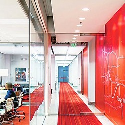 A red hallway with a red carpet.
