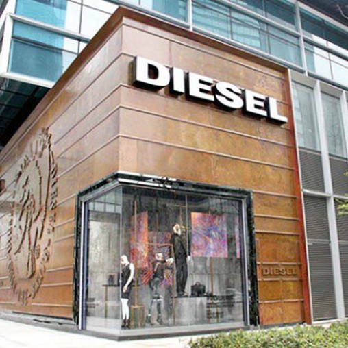 A store front with a sign.