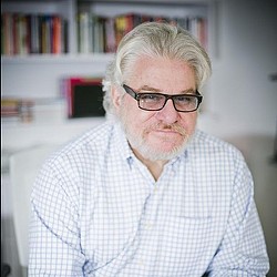 A man wearing glasses.