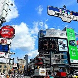 A city street with billboards.