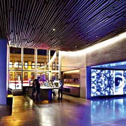 A room with a table and chairs.