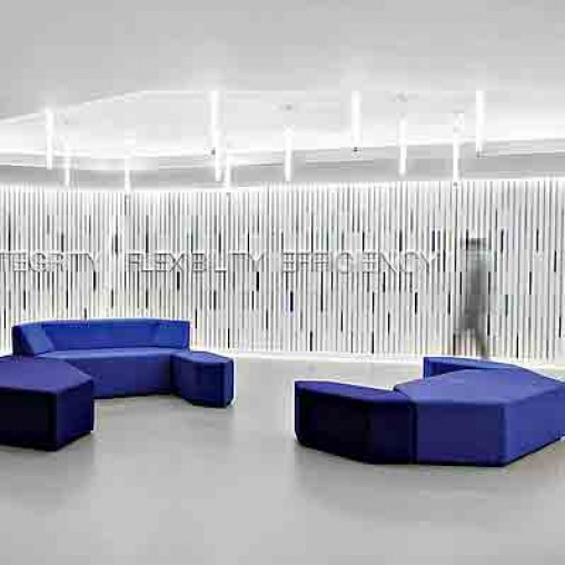 A room with blue couches.