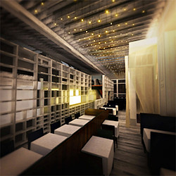 A room with tables and chairs.