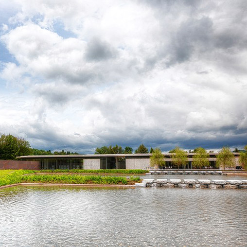 A building next to a body of water.