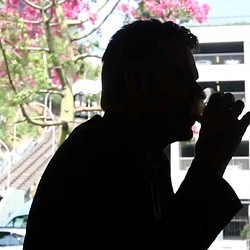 A person holding a camera.