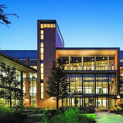 A building with a tall tower.