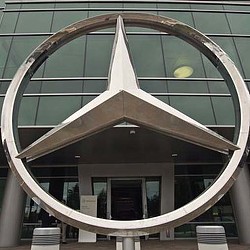 A circular building with a glass roof.