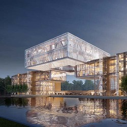 A building with a bridge over water.